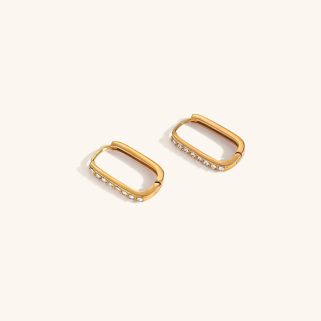 Maya Guld Hoop Øreringe" can be rewritten as "Maya Gold Hoop Earrings.