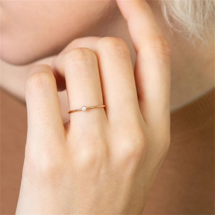 Amelia Ring med Ægte Sten" can be rewritten as "Amelia Ring med Naturlige Sten.