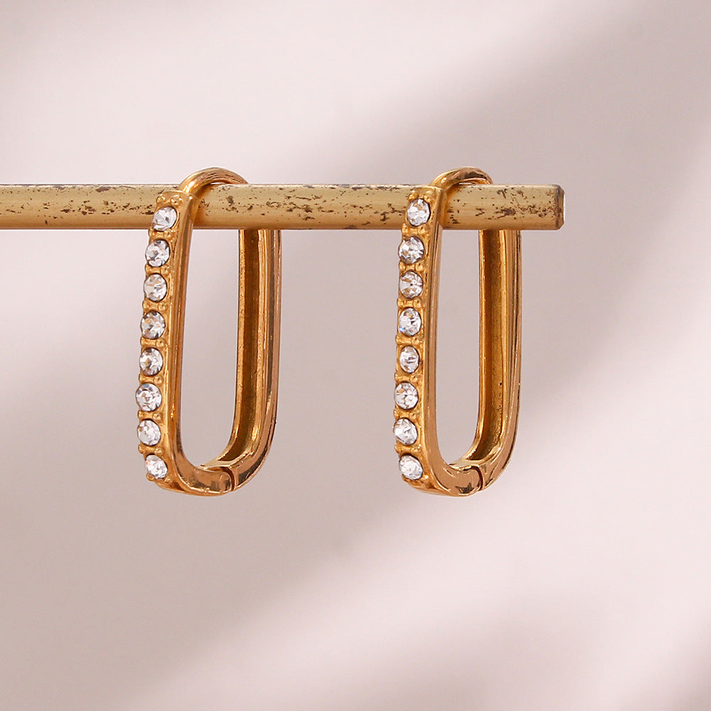 Maya Guld Hoop Øreringe" can be rewritten as "Maya Gold Hoop Earrings.