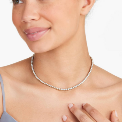 ABBY Rund Tennis Halskæde" could be rewritten as "ABBY Rund Tennis Necklace.