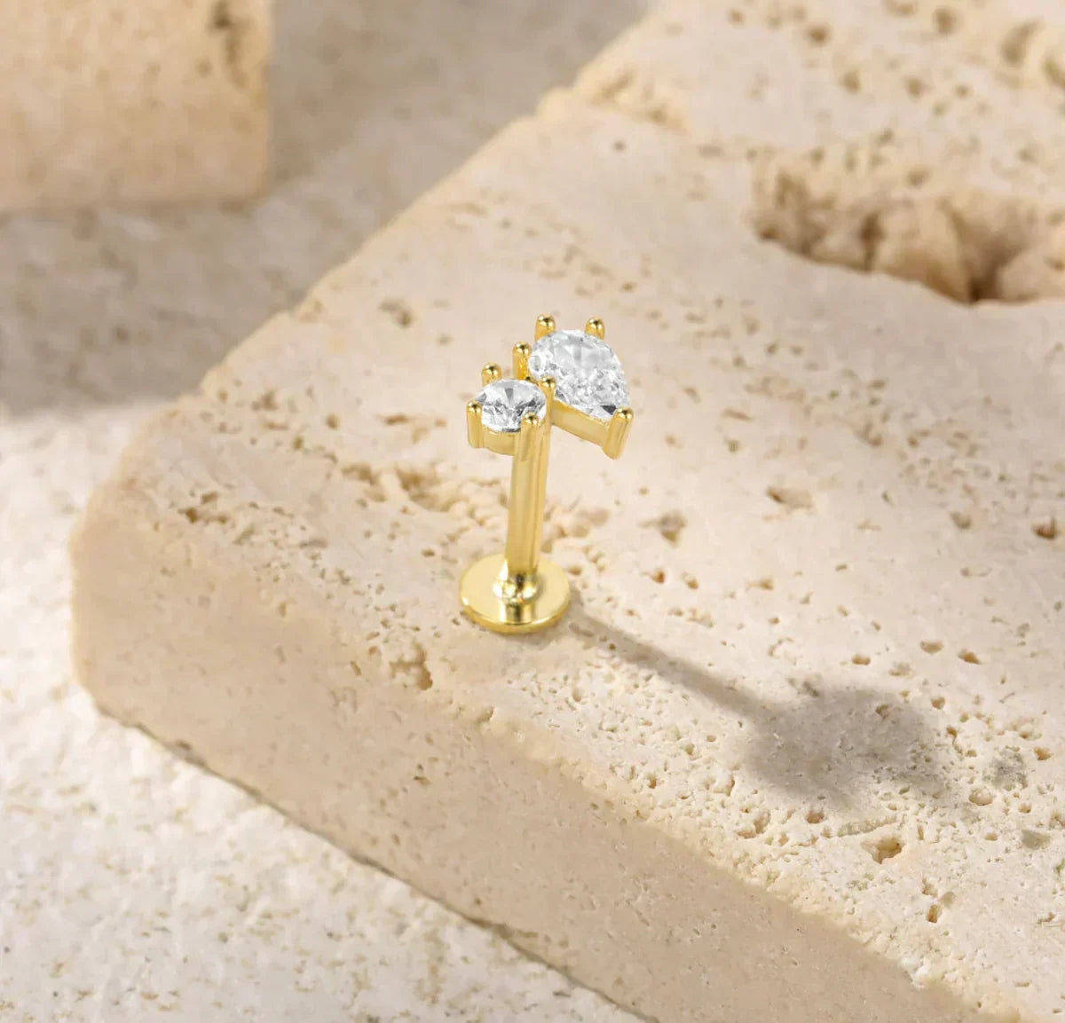 Kate Lame Øreringe med Diamantdetaljer