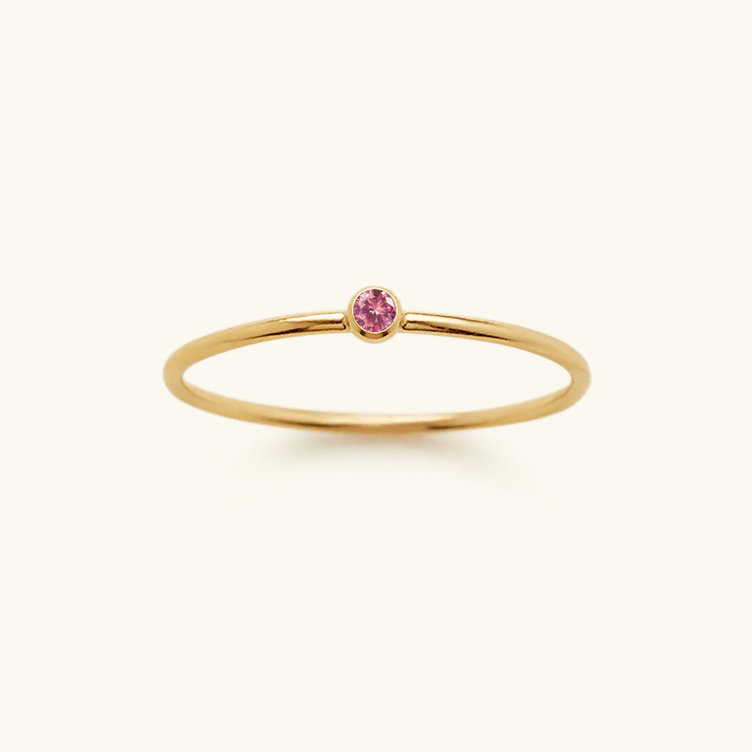 Amelia Ring med Ægte Sten" can be rewritten as "Amelia Ring med Naturlige Sten.